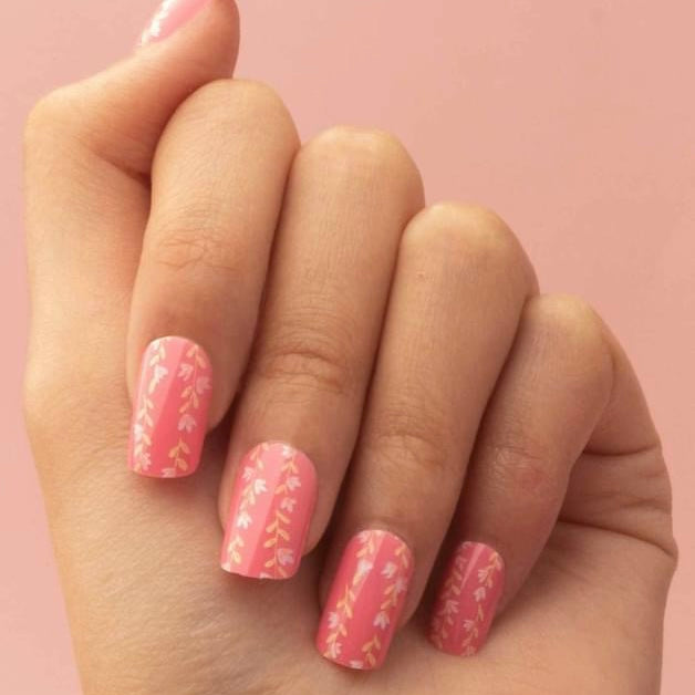 Hot pink nail dashes with floral pattern