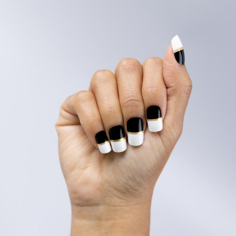 Black and White nails with gold stripe