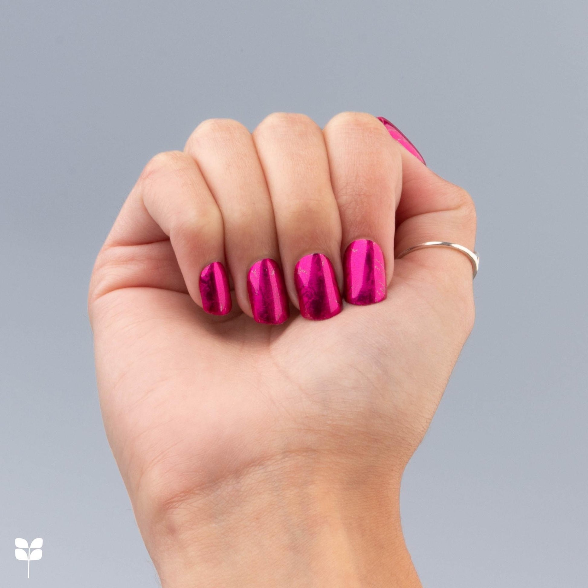 Beautiful manicured nails that last 2 weeks. Metallic hot pink nail accessories